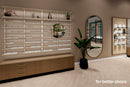Venice B | Arcades | Wall display with lit shelving and mirror